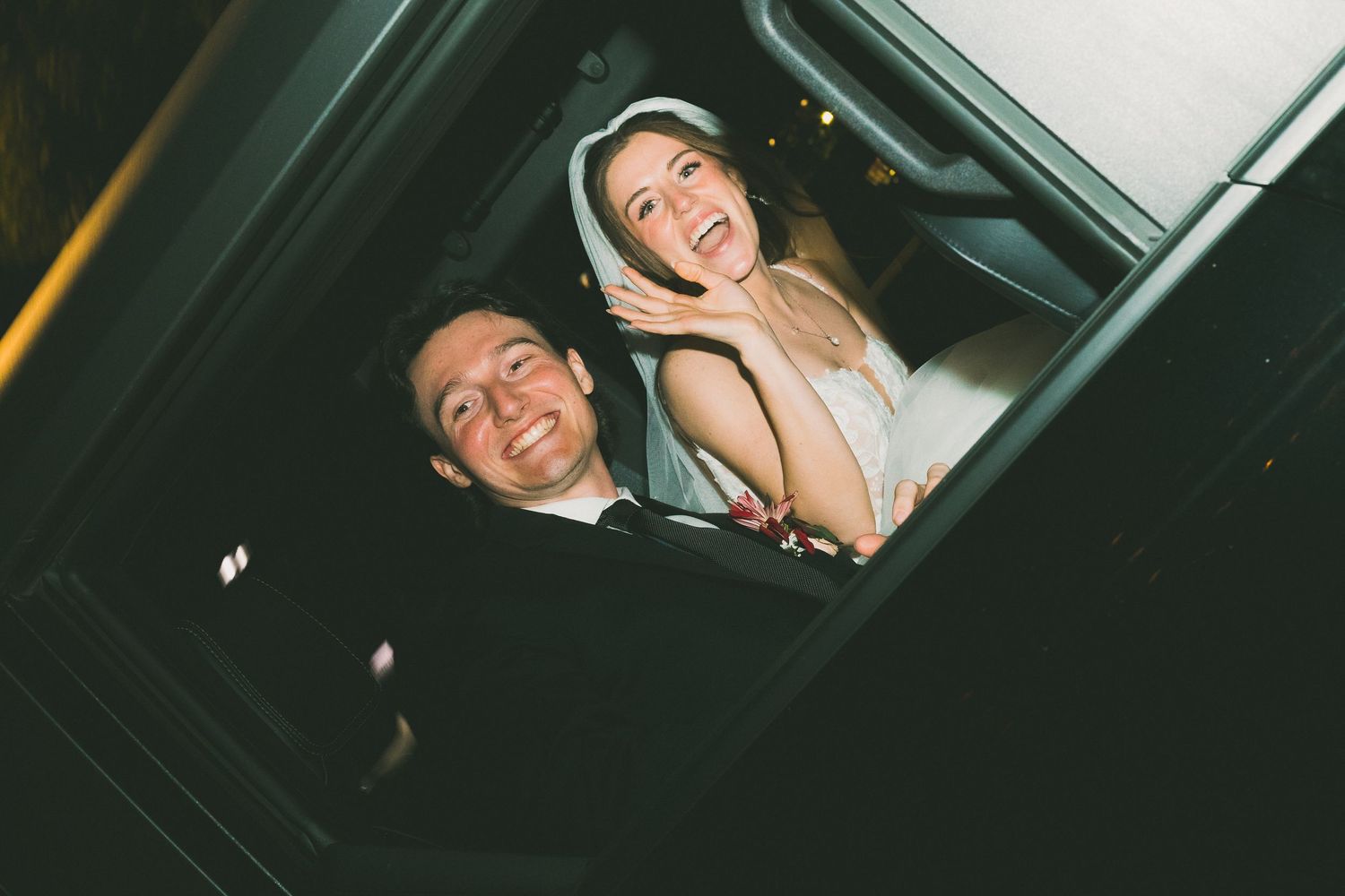 A person smiles while sitting in a car, with multiple similar photos showing the same scene from different angles.