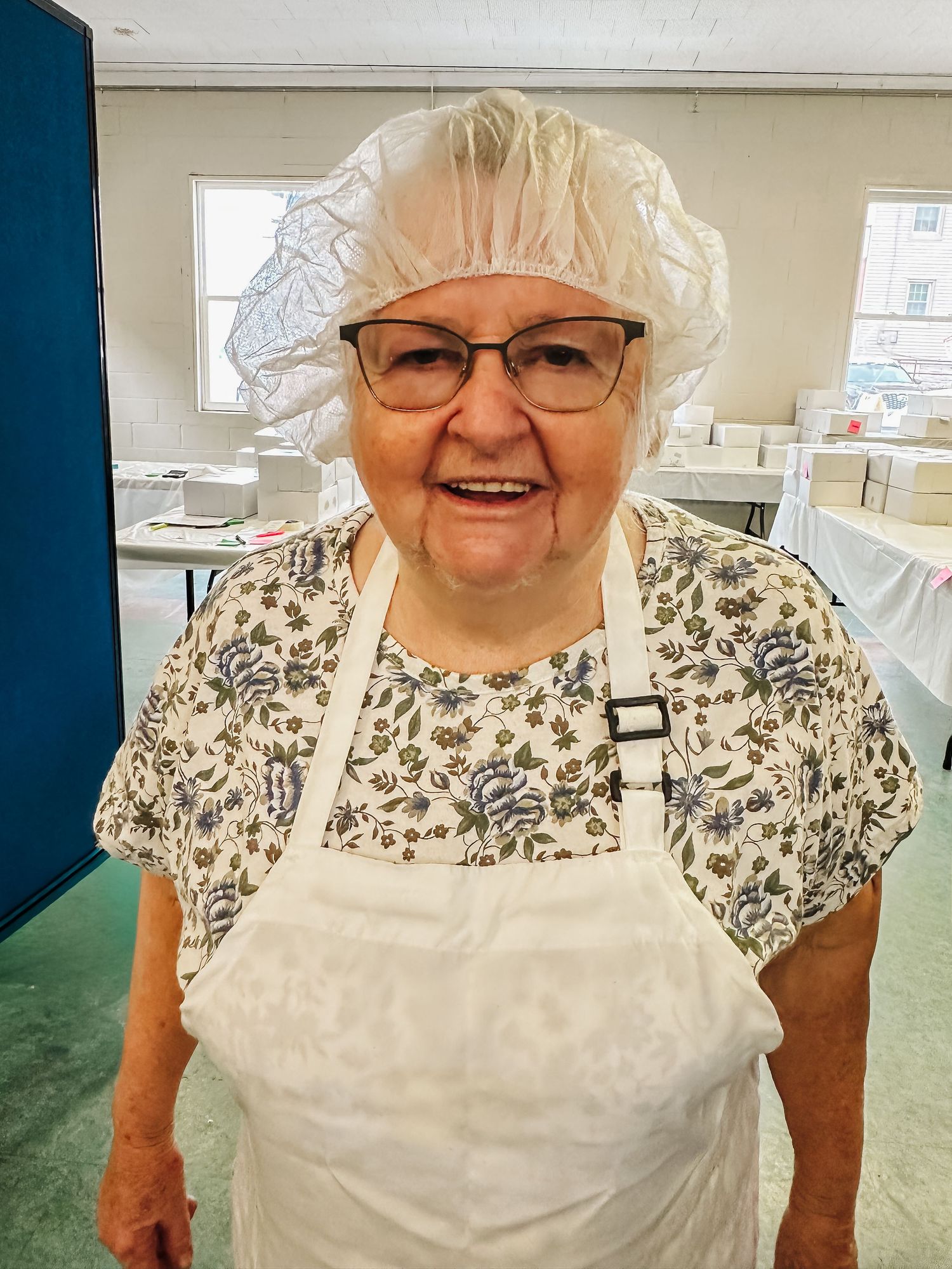 Elsie Zimmerman smiling, embodying her legacy of kindness and community service through donut fundraisers.