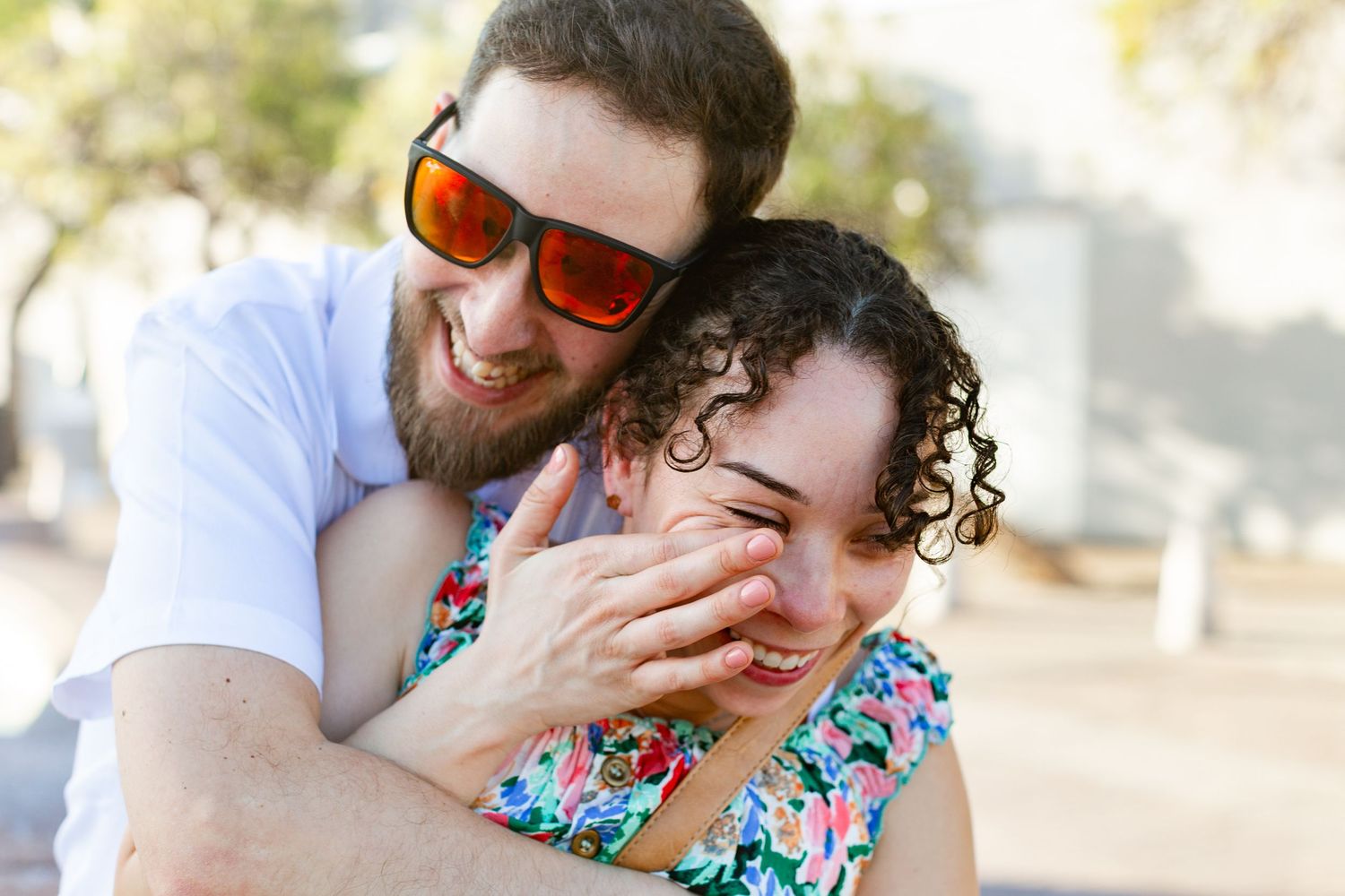 Couples portrait. Marriage proposal at Fuente Raíces in Old San Juan, Puerto Rico.