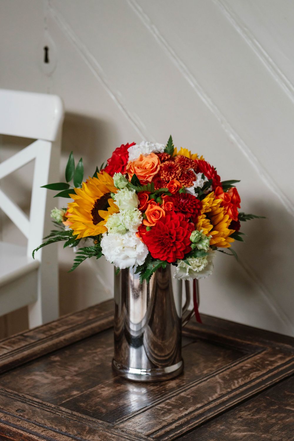 Elmore Court Wedding by Cotswolds Zara Davis Photography in Gloucestershire bridal bouquet with yellow and orange flowers