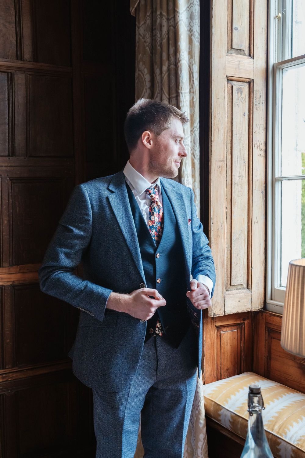 Elmore Court Wedding by Cotswolds Zara Davis Photography in Gloucestershire groom getting ready in main house