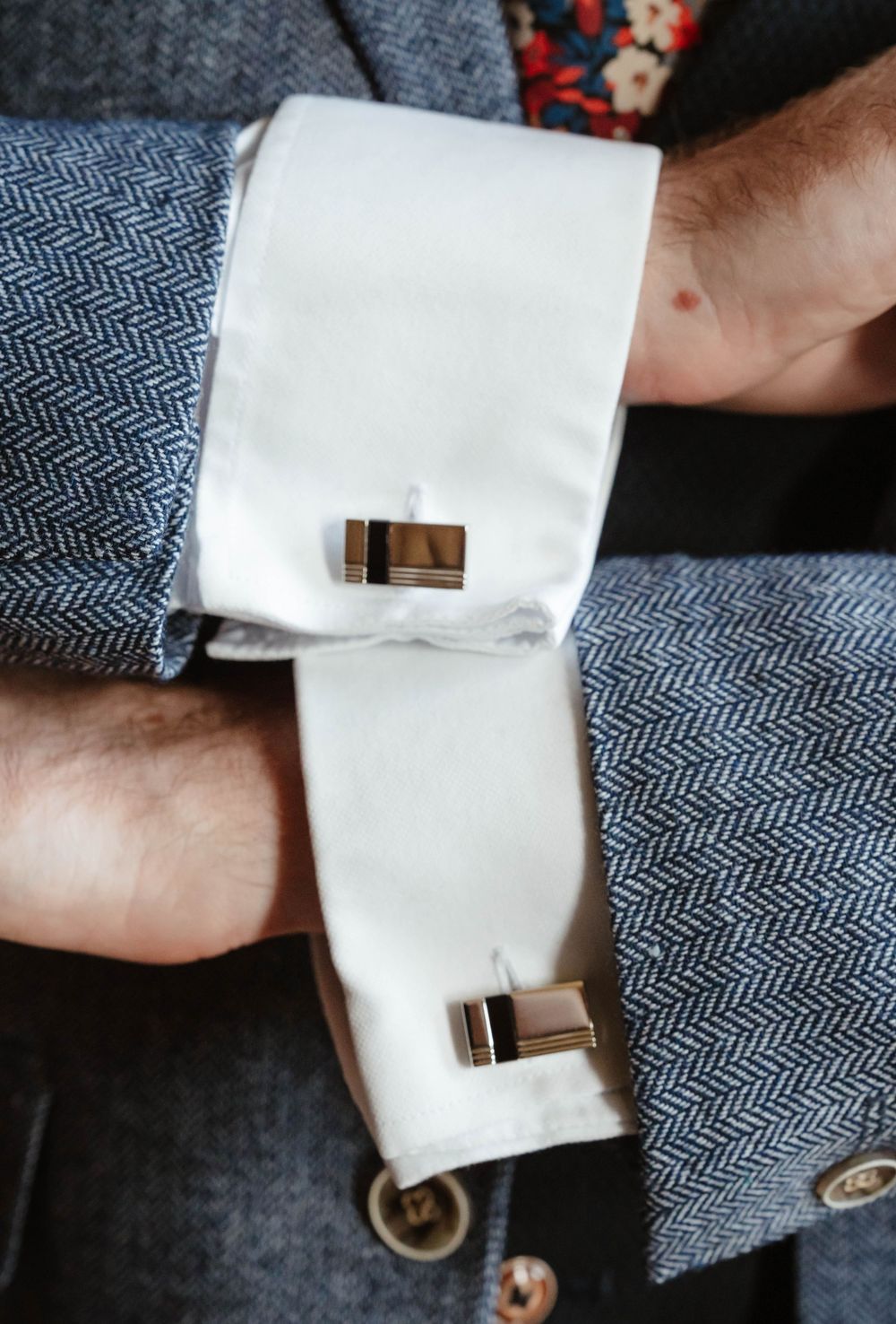 Elmore Court Wedding by Cotswolds Zara Davis Photography in Gloucestershire grooms cufflinks close up