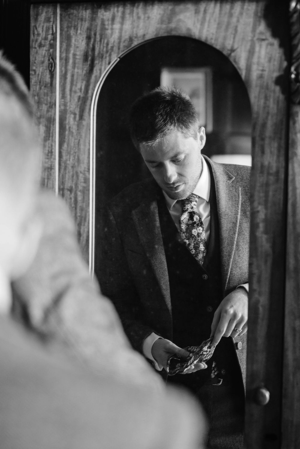 Elmore Court Wedding by Cotswolds Zara Davis Photography in Gloucestershire grooms reflection whilst getting ready