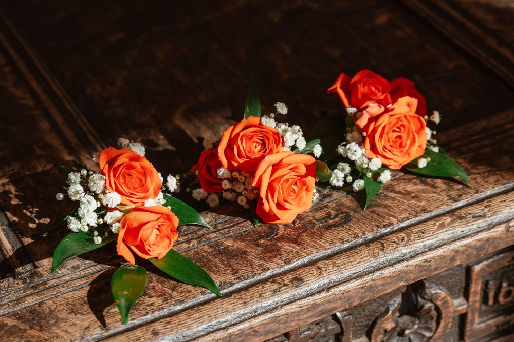 Elmore Court Wedding by Cotswolds Zara Davis Photography in Gloucestershire groomsmen buttonholes close up