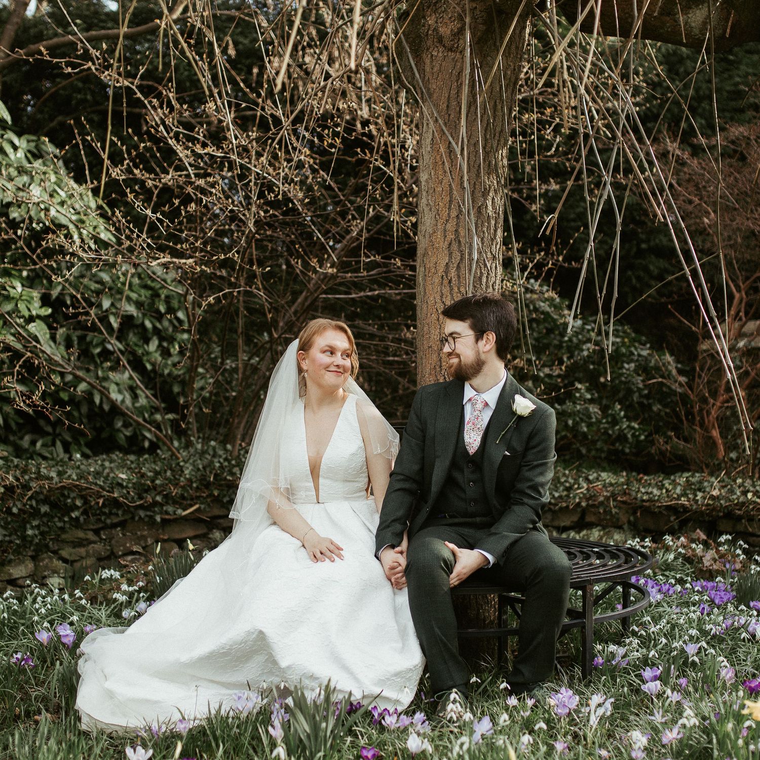 Romantic meaningful moments between couple at Holdsworth House Weding Venue Gardens in Spring