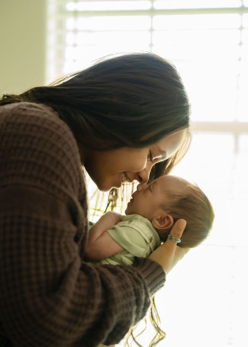 Cozy nursery newborn photos captured in Houston in-home photography session