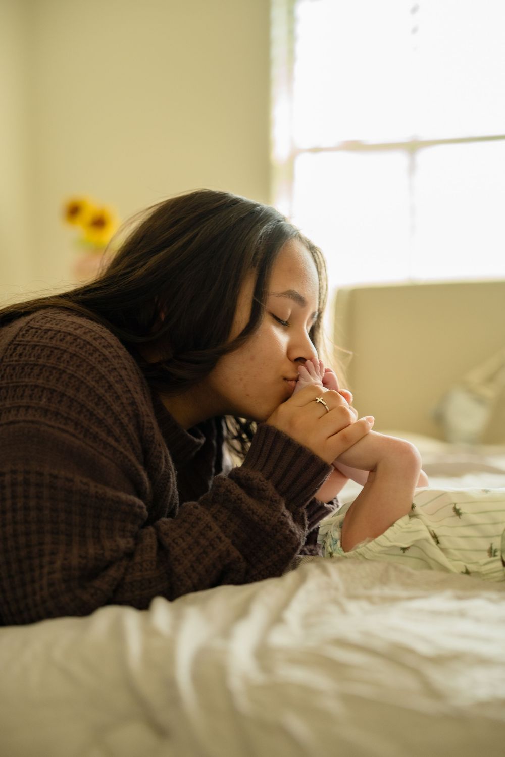 Cozy nursery newborn photos captured in Houston in-home photography session
