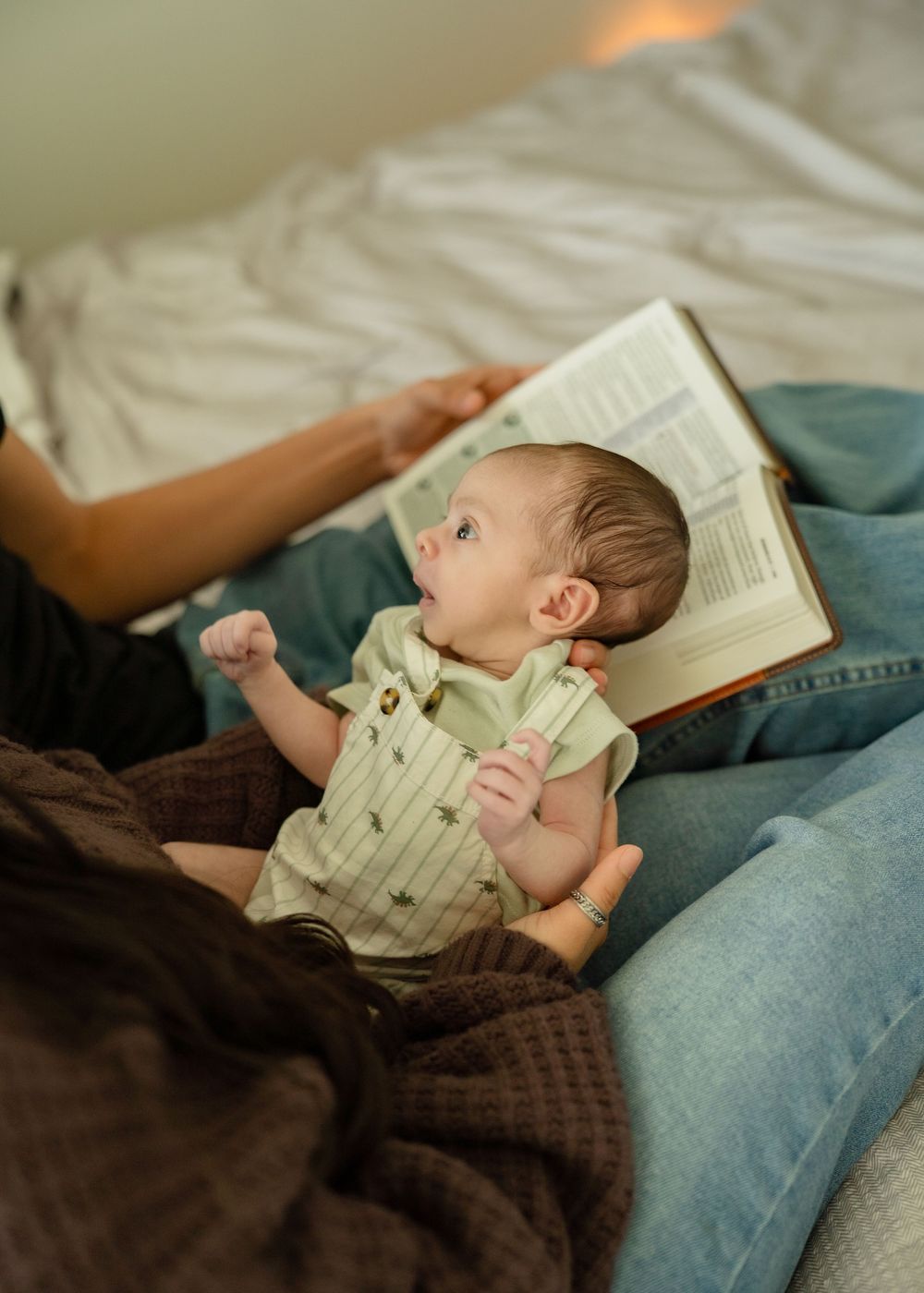 Houston in-home newborn photography of first-time parents with 4-week-old baby boy in natural light