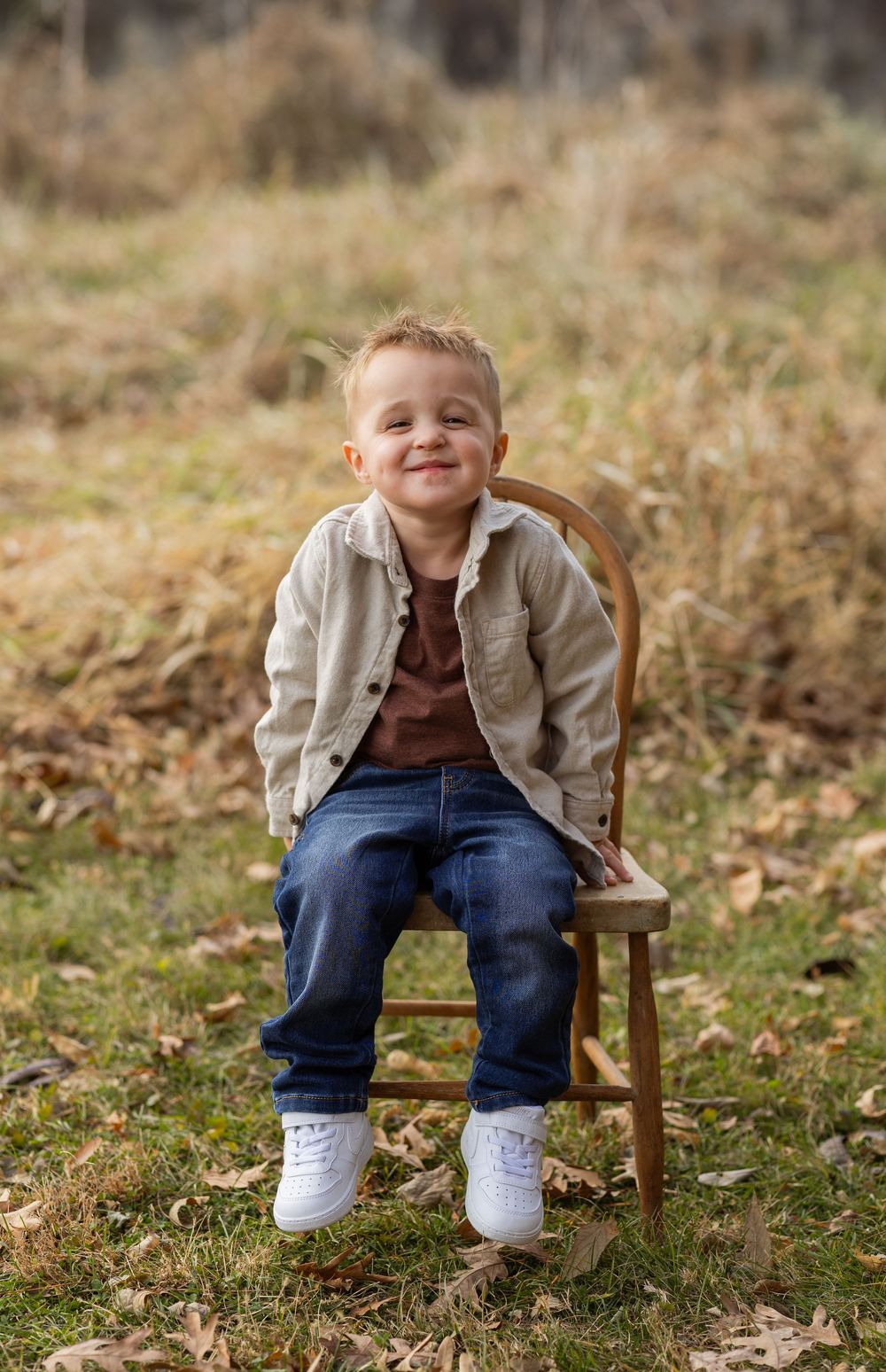 A sequence of photos showing a child sitting in a small wooden chair outdoors among autumn leaves.
