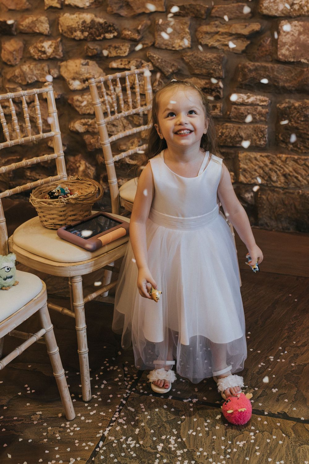browsholme and the tithe barn wedding photography flower girl confetti