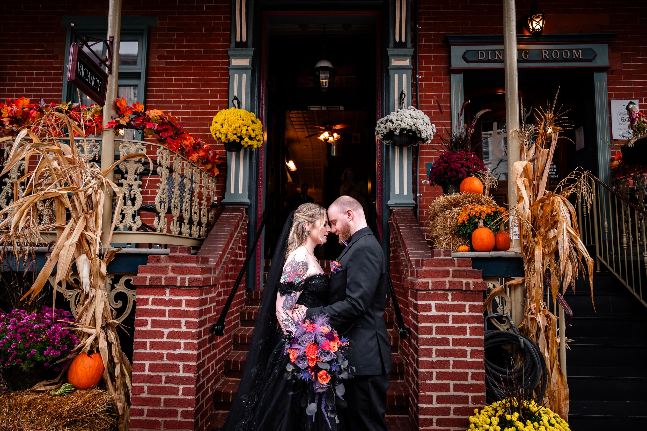 A series of fall-themed outdoor portraits with autumn decor and pumpkins against a rustic brick backdrop.