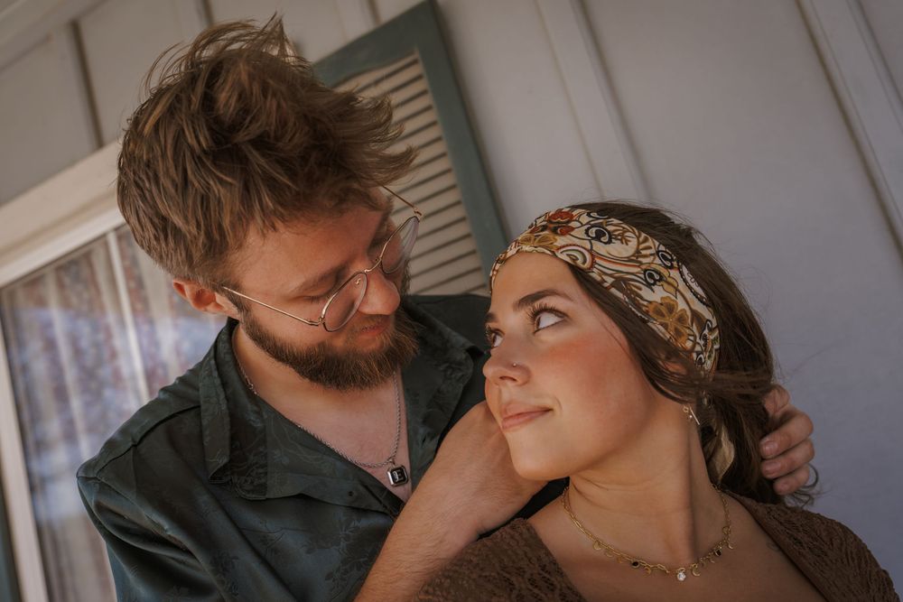 Romantic couple in wedding attire sharing intimate moments in a series of candid photographs.