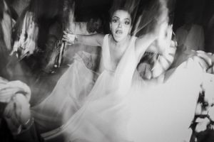 Artistic black and white portrait with multiple exposure creating ghostly effect.