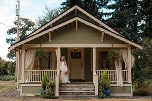 A series of craftsman-style bungalow houses with covered front porches and taupe exterior paint shown in different angles.