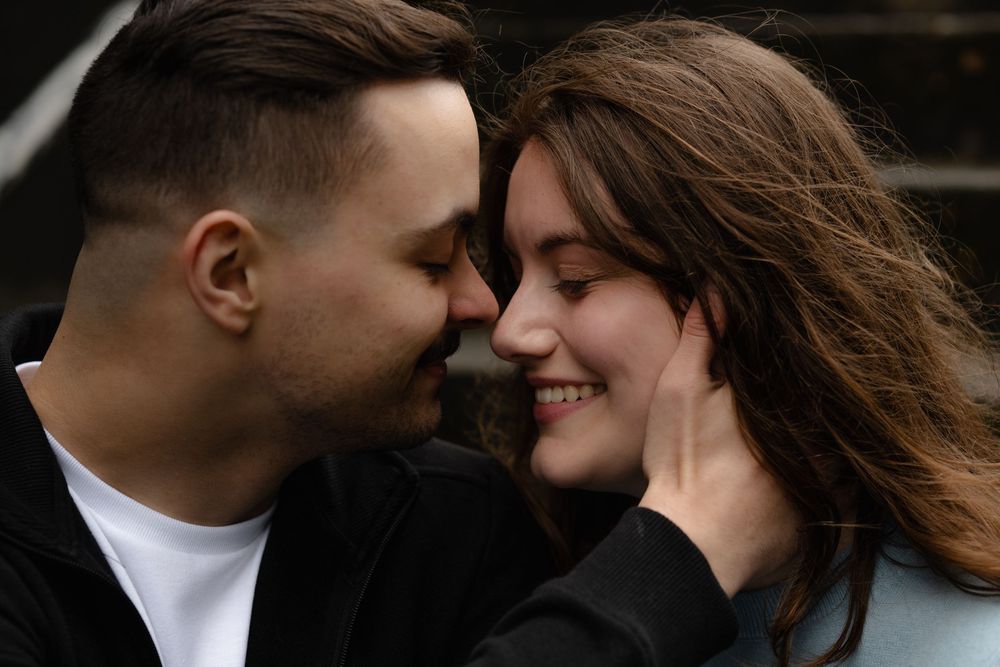 Two people in a romantic pose share an intimate moment in a series of six similar photos arranged horizontally.
