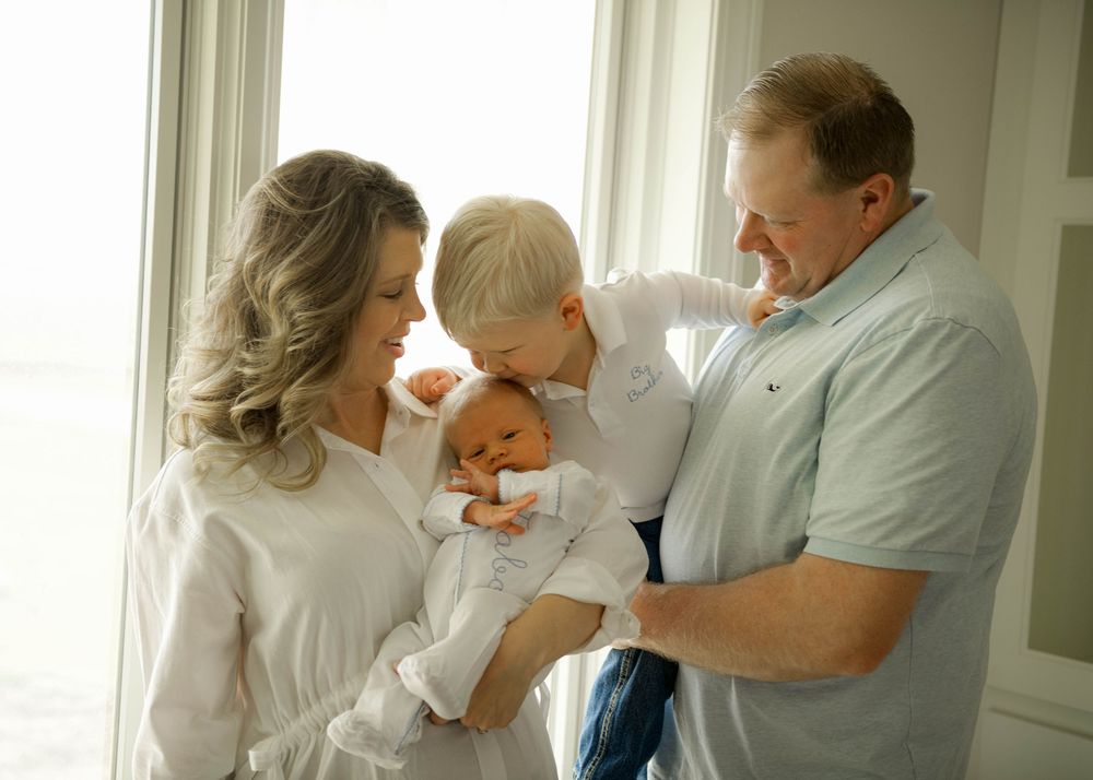 Series of candid moments shared between family members in a bright, airy room.