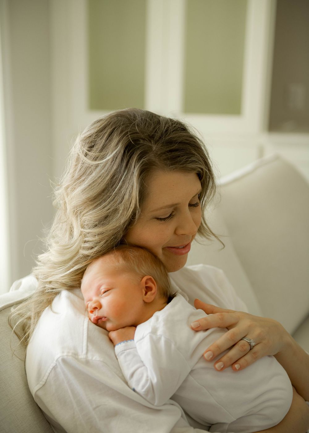 Gentle embraces and quiet moments captured in a sequence of soft, natural light photographs.