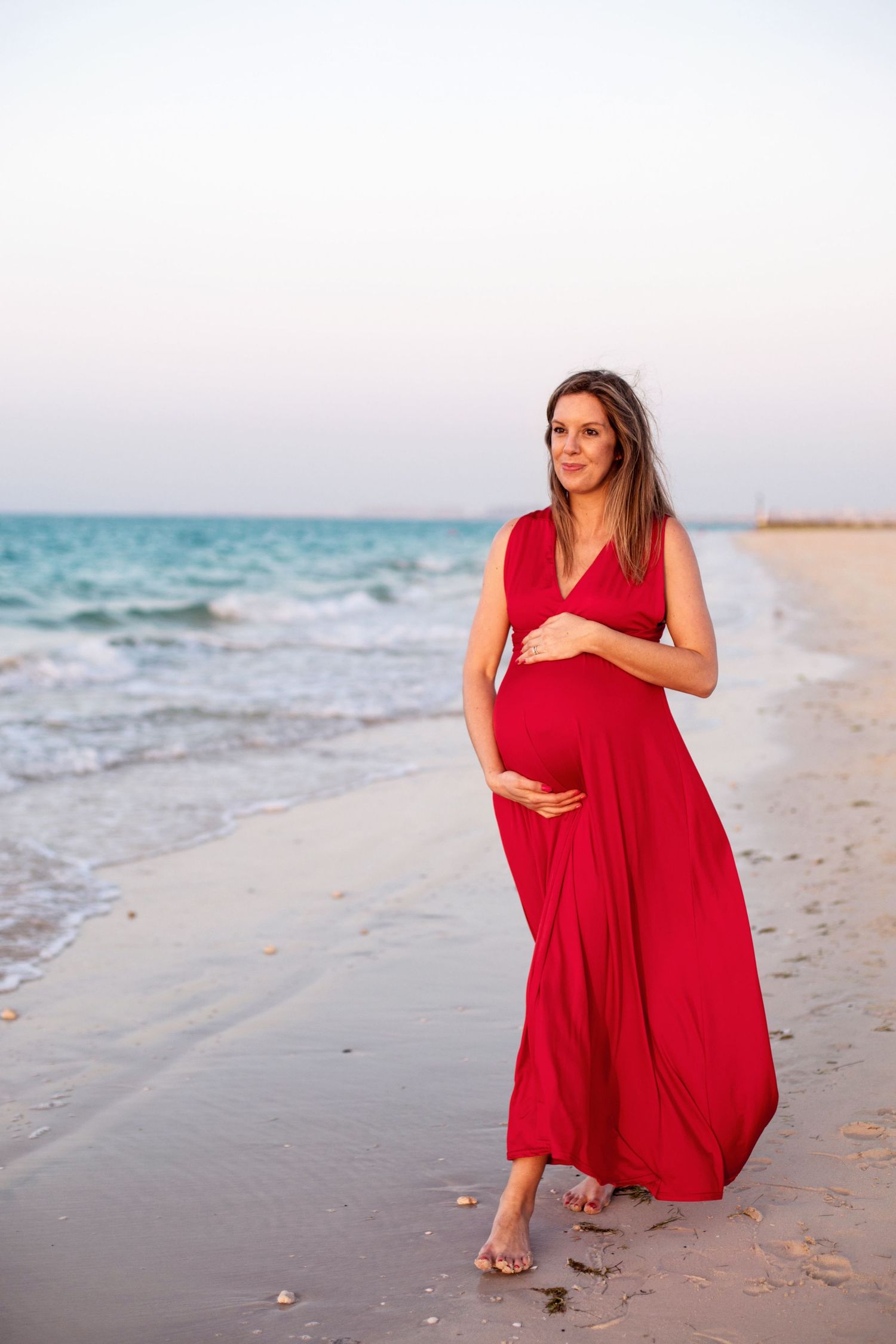 beach photoshoot in abu dhabi clinet closet options red dress