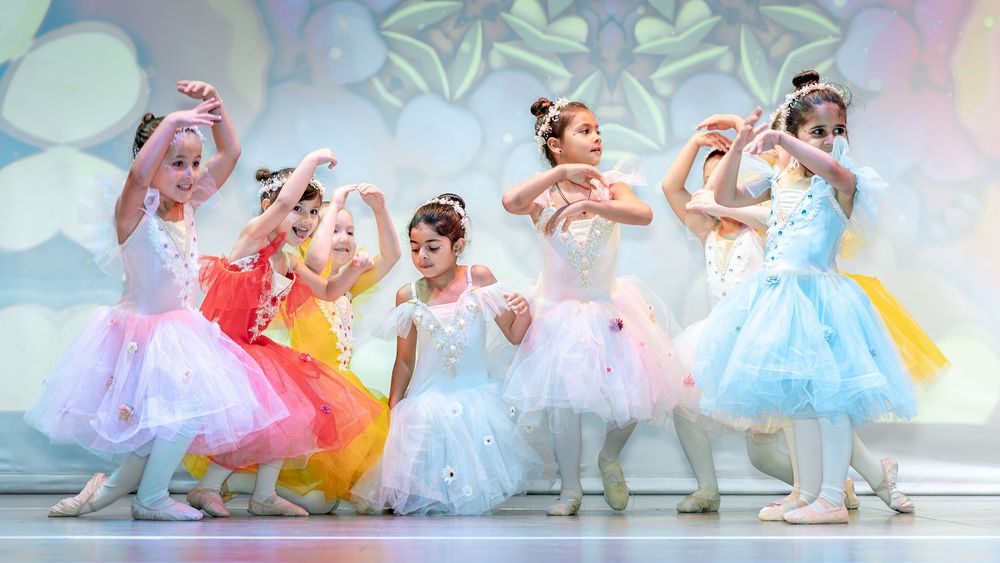 Kids ballet photoshoot in Dubai featuring soft lighting and elegant dance poses