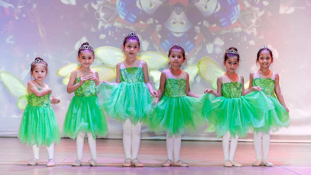 Graceful twirl captured during a ballet kids session in a professional Dubai studio