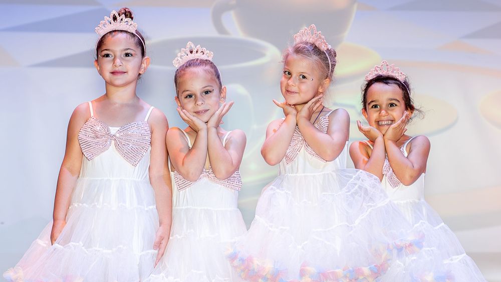 Kids ballet photoshoot in Dubai featuring soft lighting and elegant dance poses