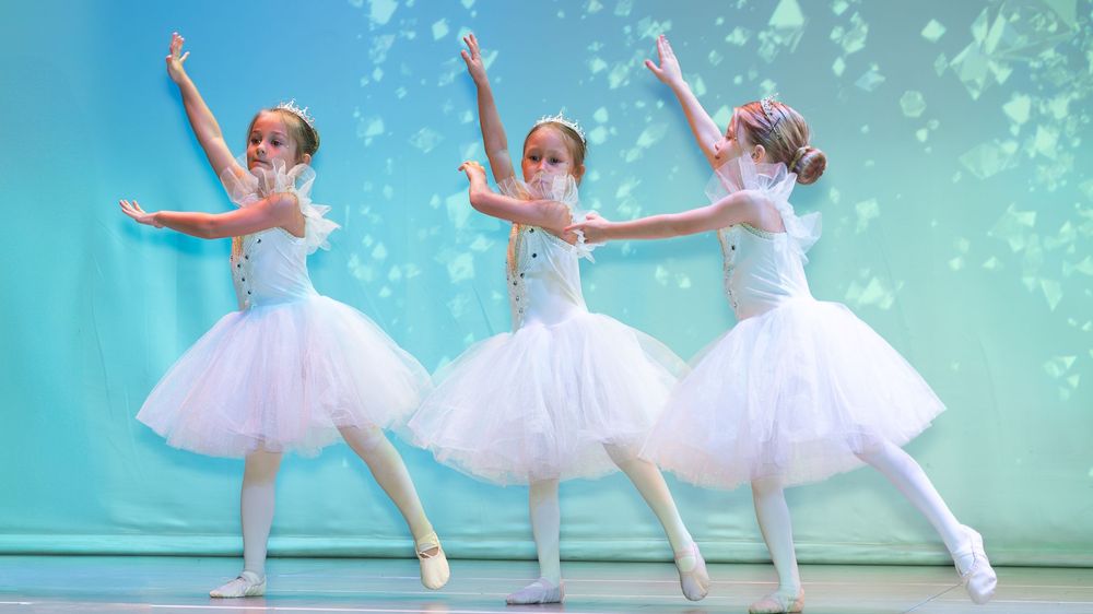 Children's ballet photography in Dubai dance academy with professional lighting and soft pastel tones