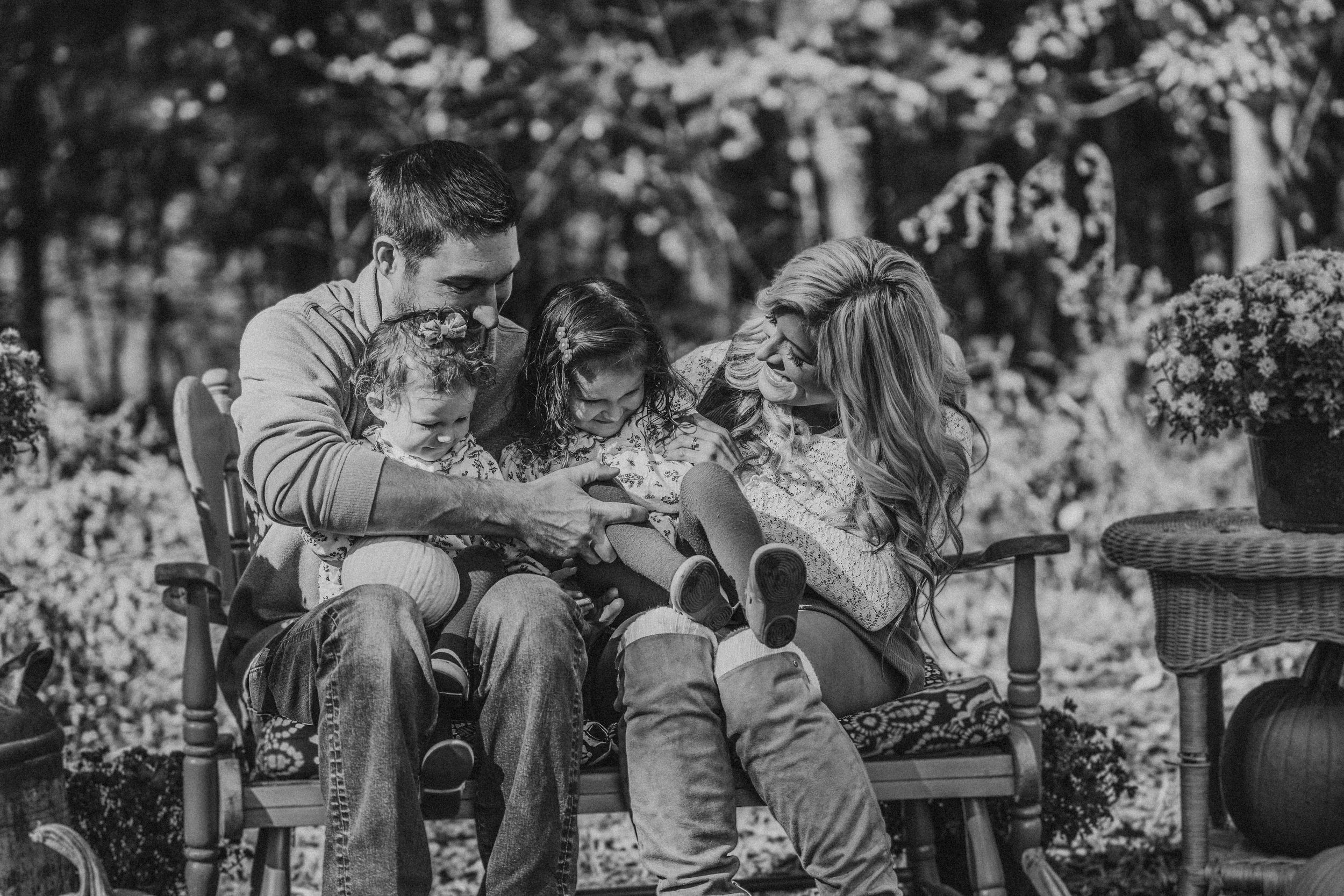 Black and white image sequence showing sentimental moments on a bench in nature.