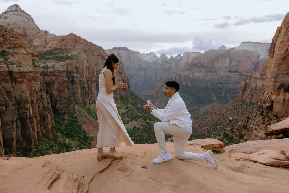 A sequence of seven photos showing panoramic canyon scenes and two people hiking along the rocky cliffs at sunset.