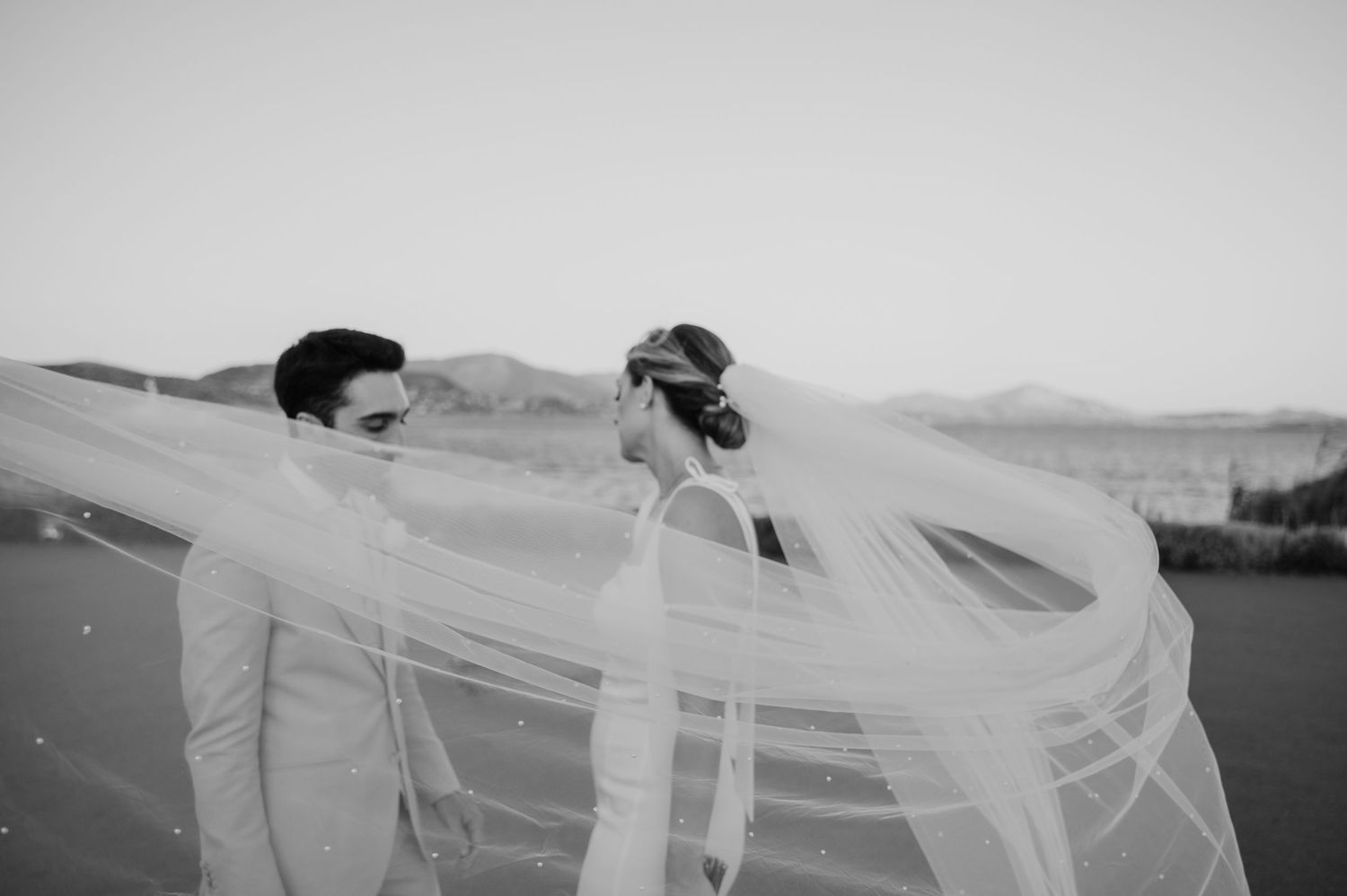 An artistic portrait of a bride and groom after their wedding in Pyrgos Petreza Athens