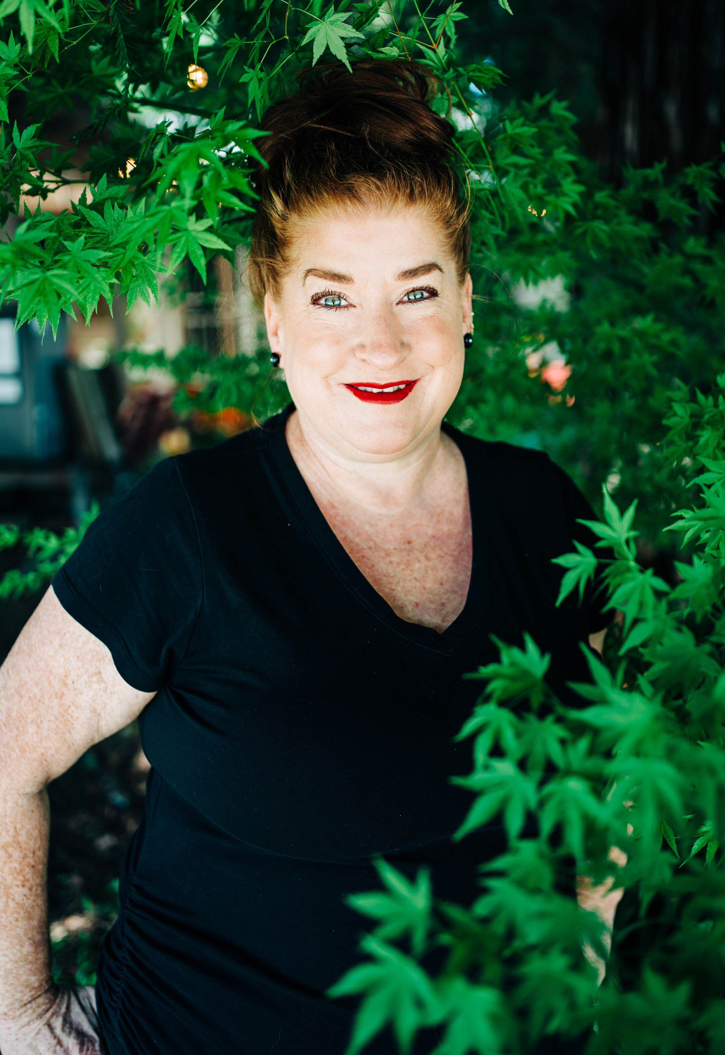 A headshot done for a charcuterie board company, specializing in her look for her website.