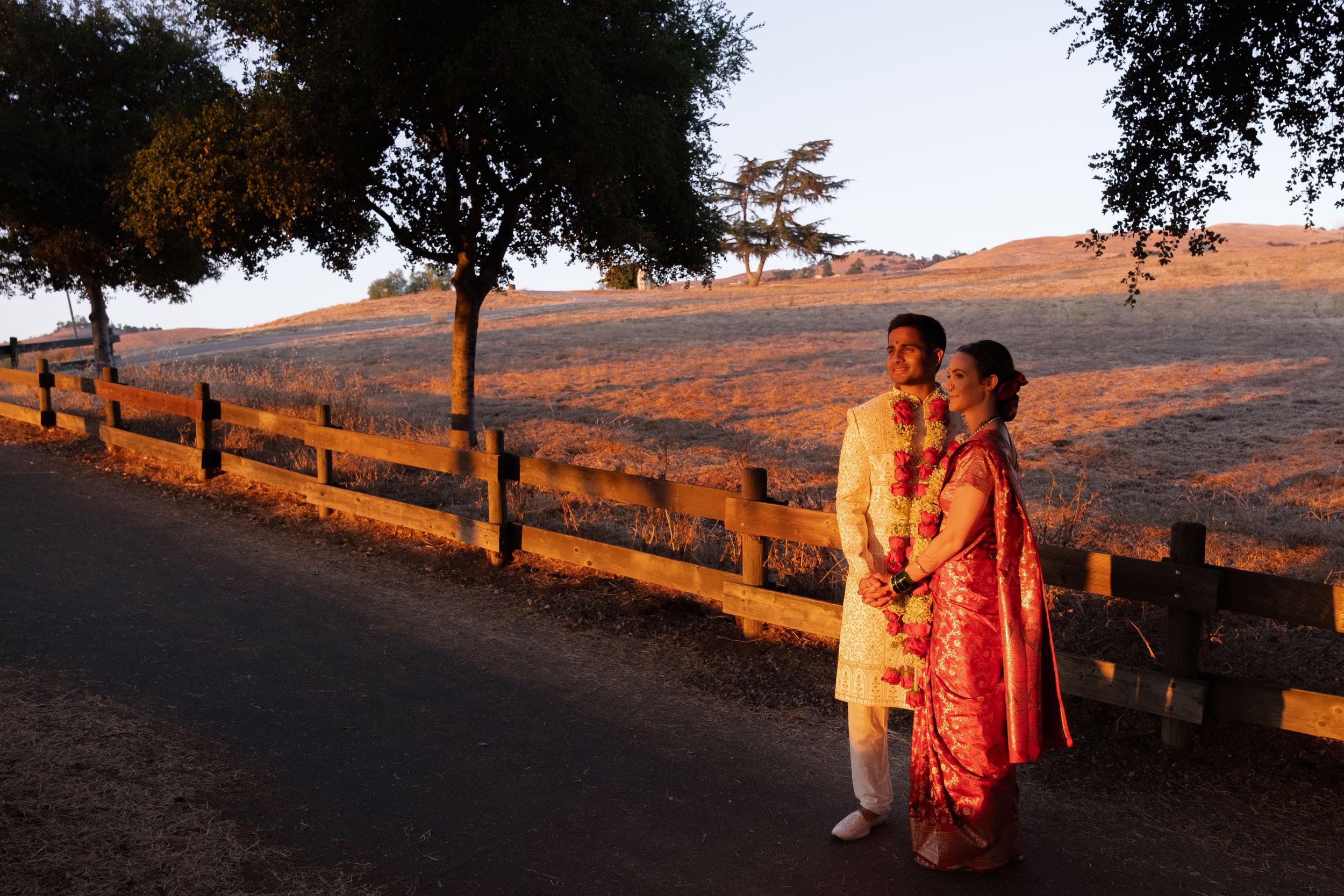 newly wed at a park during golden hour.