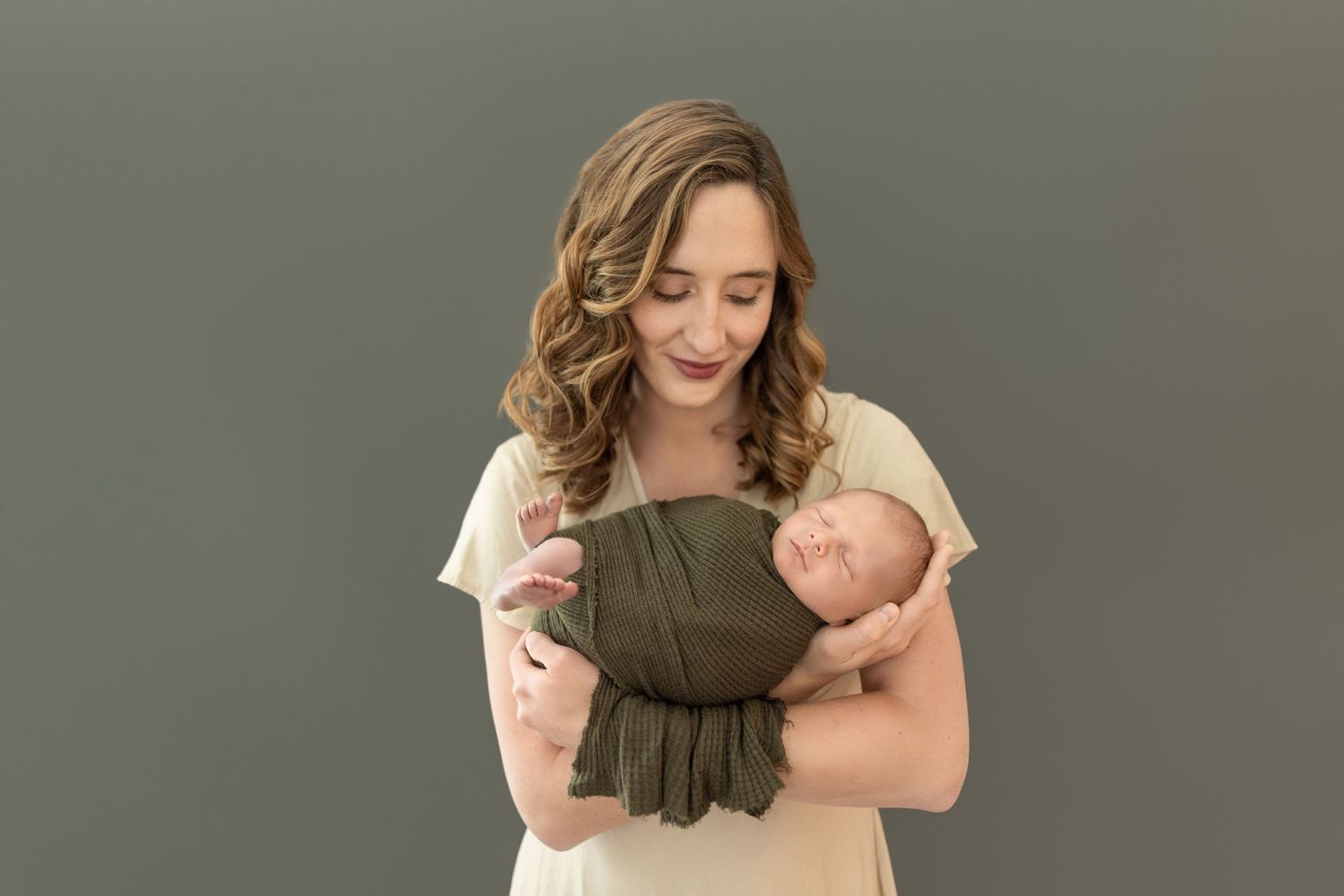 Sweet siblings lie close together and interact during a photo session. Photos by Tampa Photographer DigitalMyst Photography