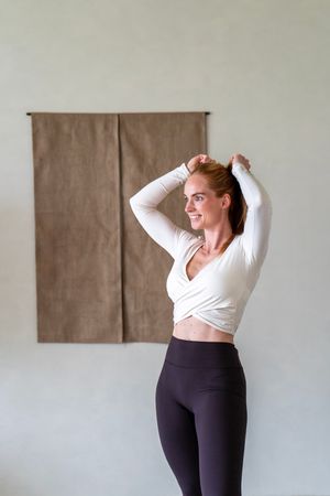 Branding shoot voor voedingsdeskundige met sportschema’s in lifestyle setting