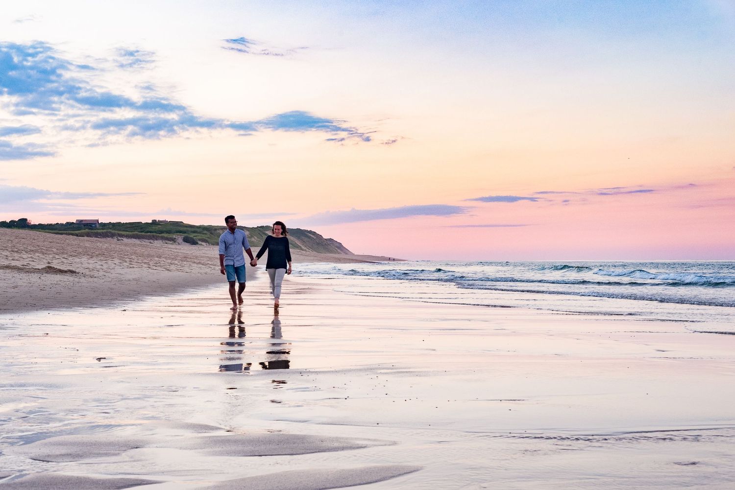 Engagement Portraits at sunset on Cahoon Hollow Beach, Wellfleet, Cape Cod, MA. Vacation photography for summer and things to do in tourism.
