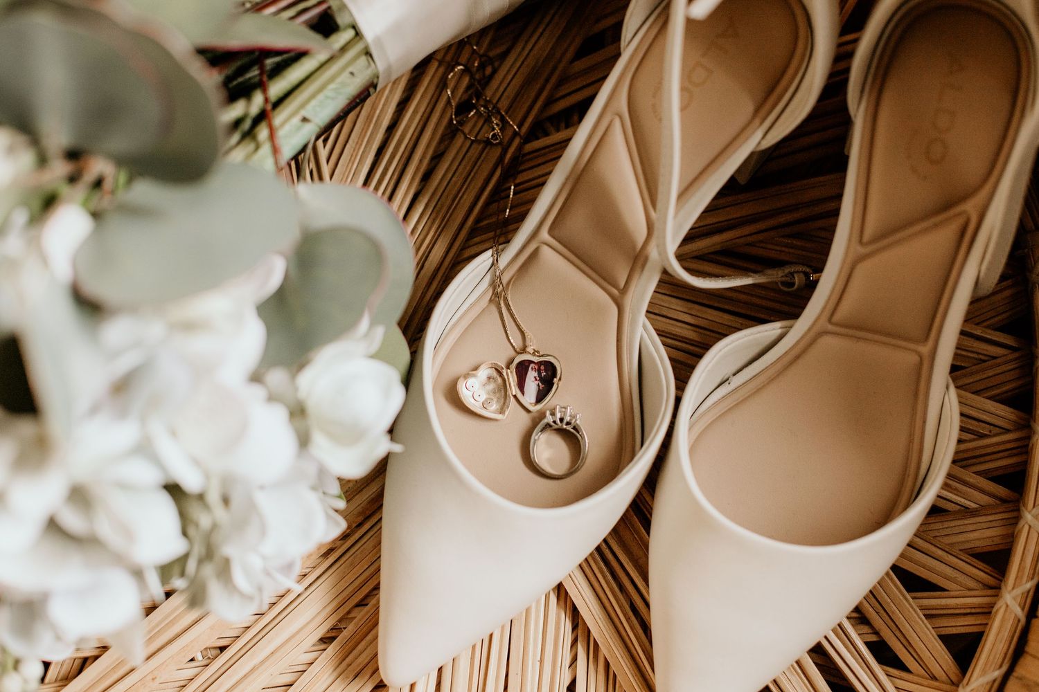 boho wedding detail photo with cream bridal heels and rings in Newfoundland