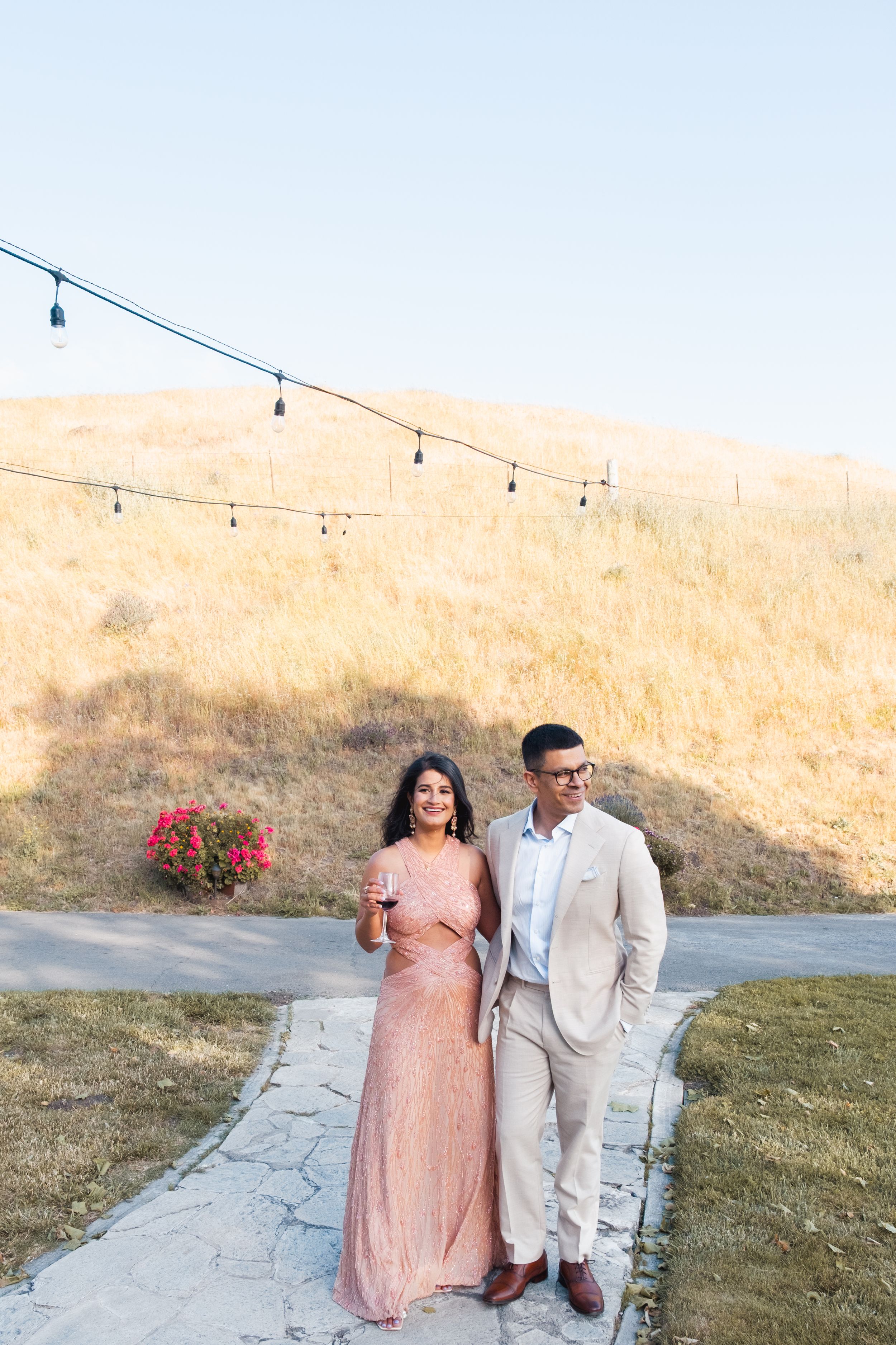 engaged couple share a candid moment.