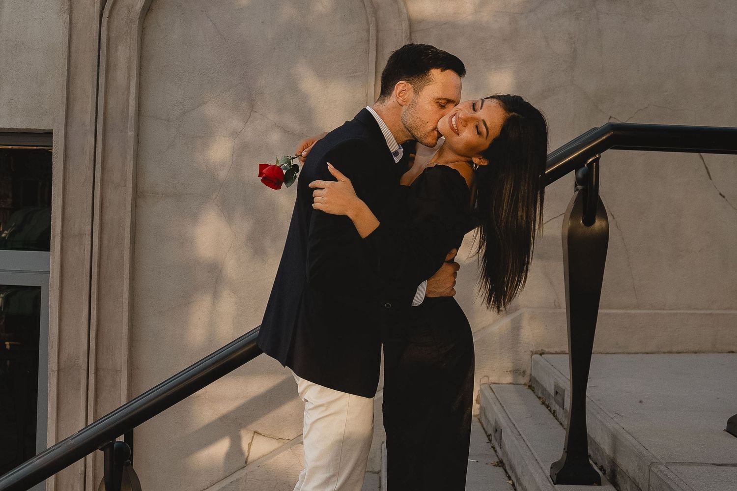 Romantic couple portrait on elegant staircase