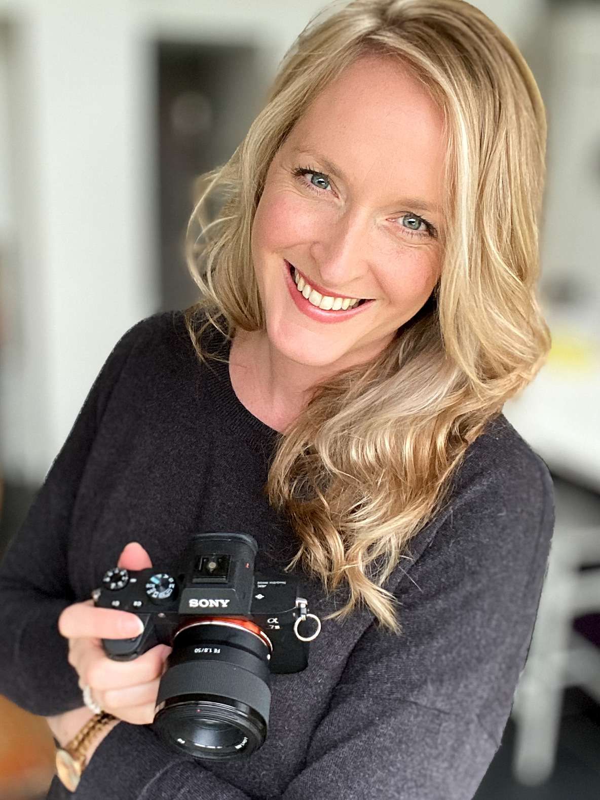 Commercial photographer Alicia Victoria working on a brand photography shoot in the UK