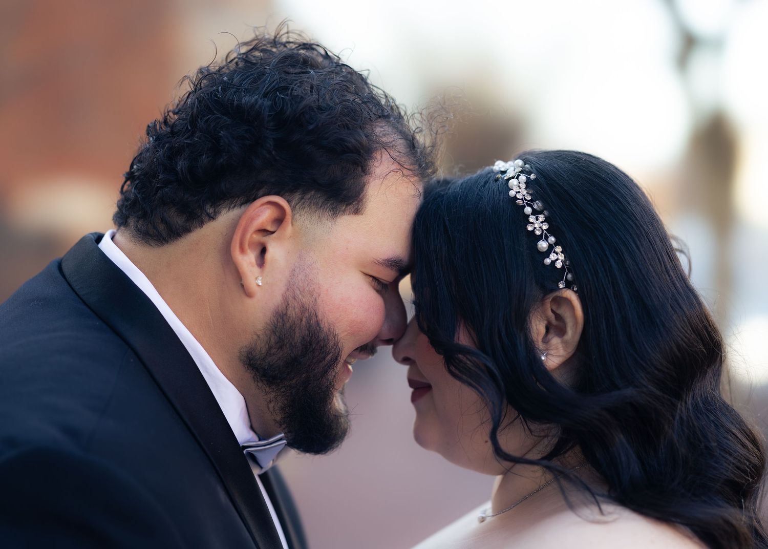 A series of romantic wedding photos showing a couple in black and white sharing intimate moments together. In downtown Annapolis