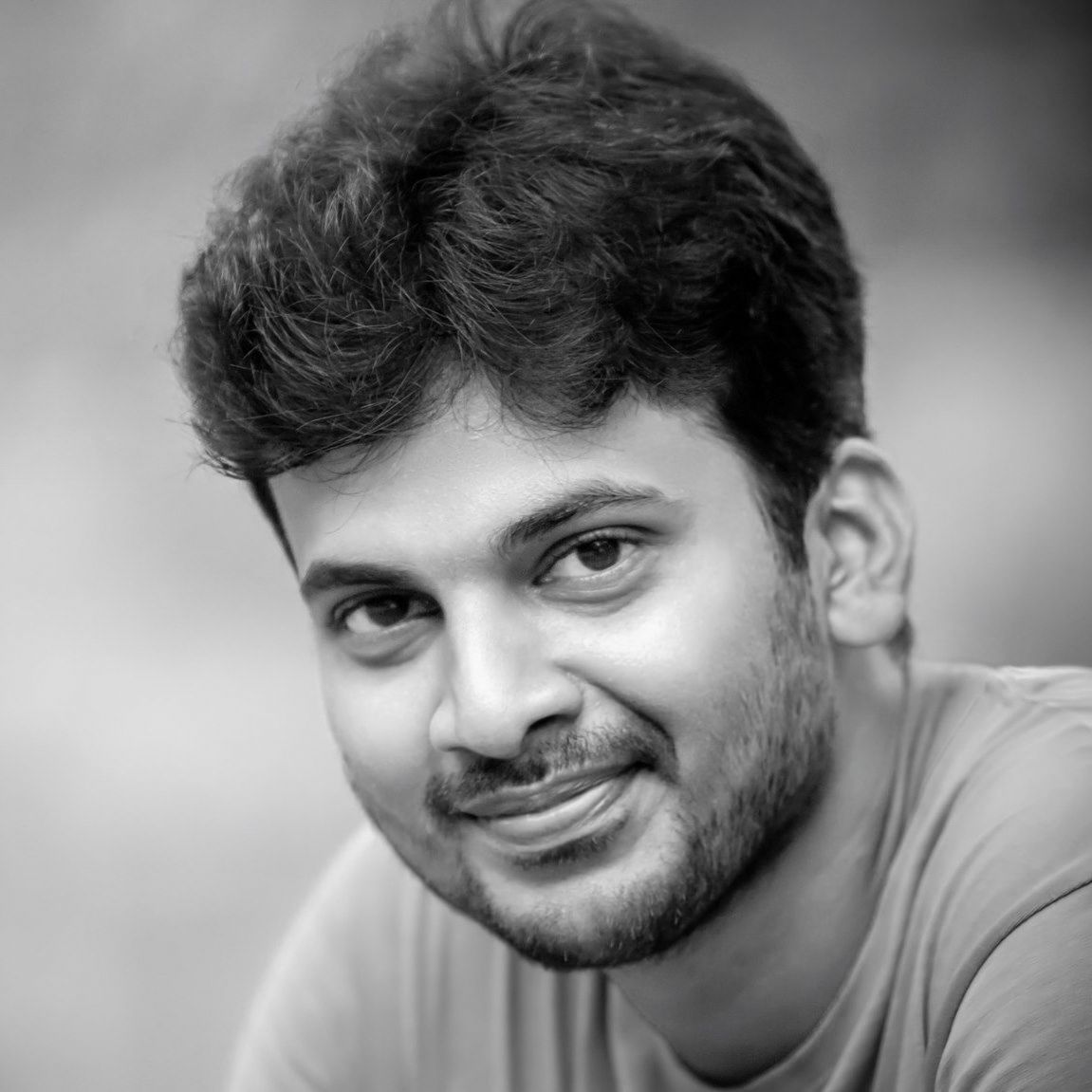 Black and white portrait of Sudhan Rajendran, Creative Head of Poetic Pics