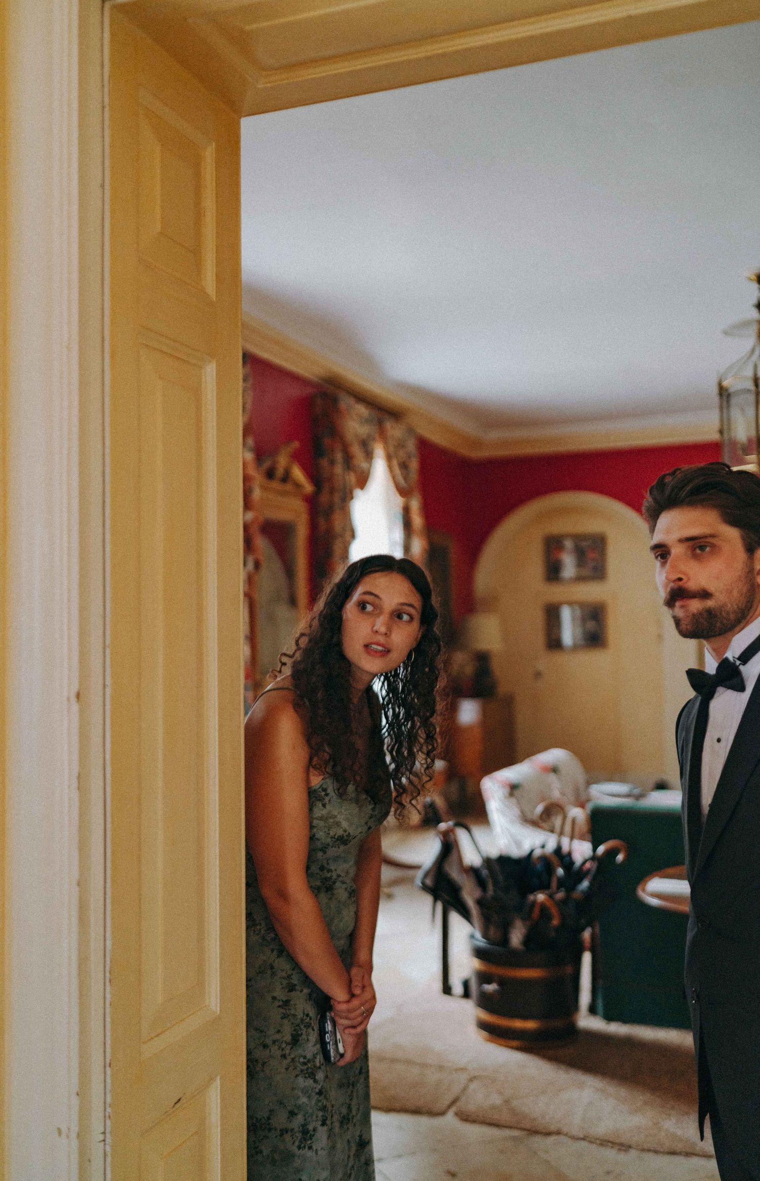 candid photo of guest looking into the distance, documentary wedding