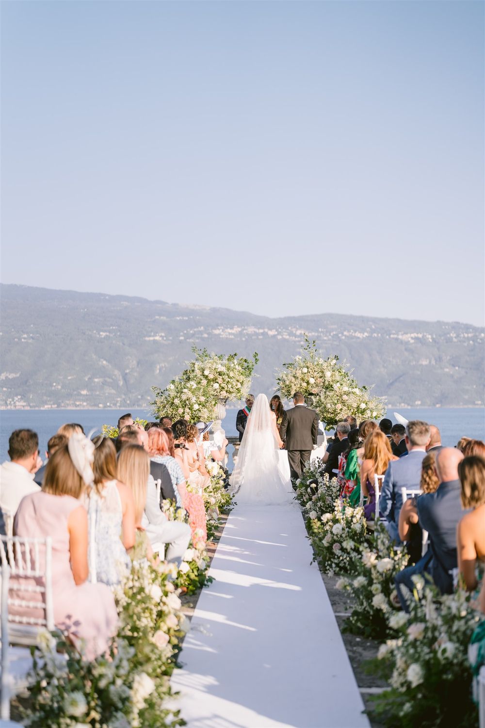 Panoramic terrace ceremony setup at Villa Bettoni overlooking Lake Garda