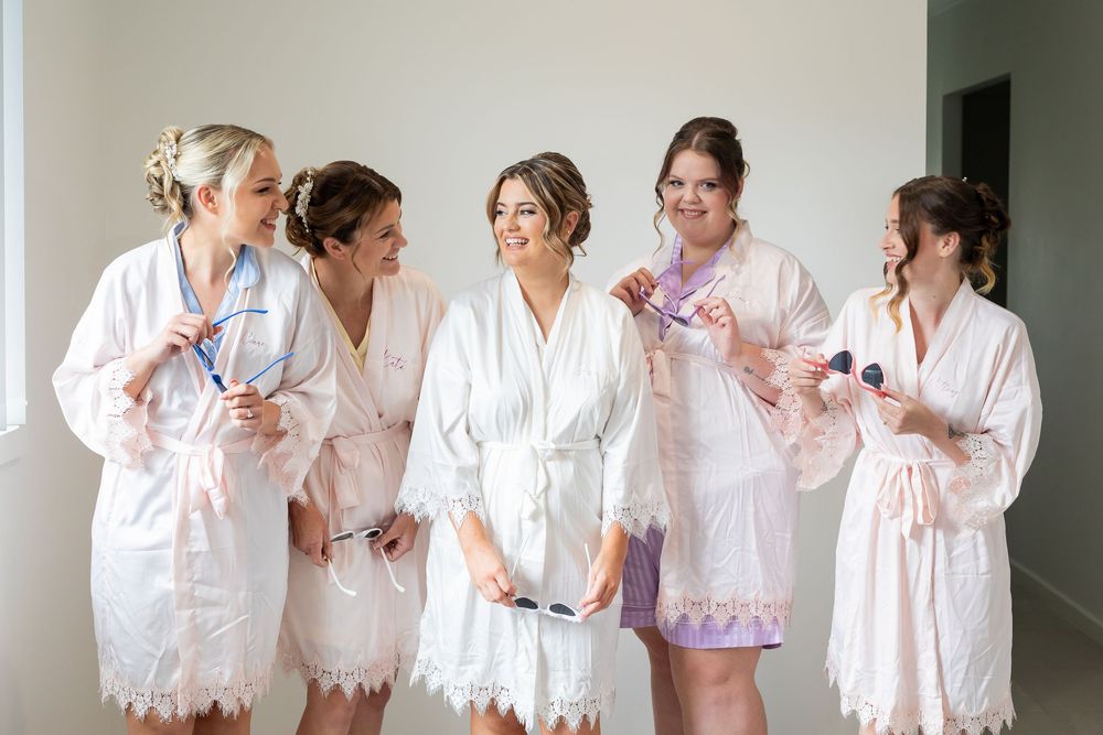 Portrait of bride getting ready with bridemaids