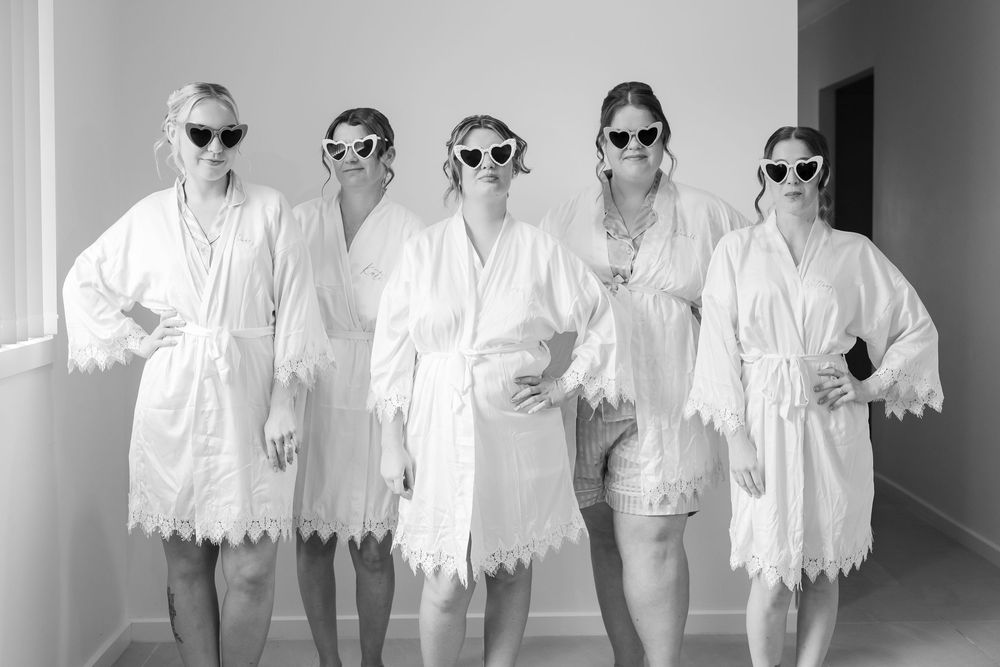 Portrait of bride getting ready with bridemaids