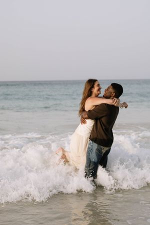 Romantic engagement session in Punta Cana featuring natural moments, golden light, and breathtaking Caribbean beach scenery.