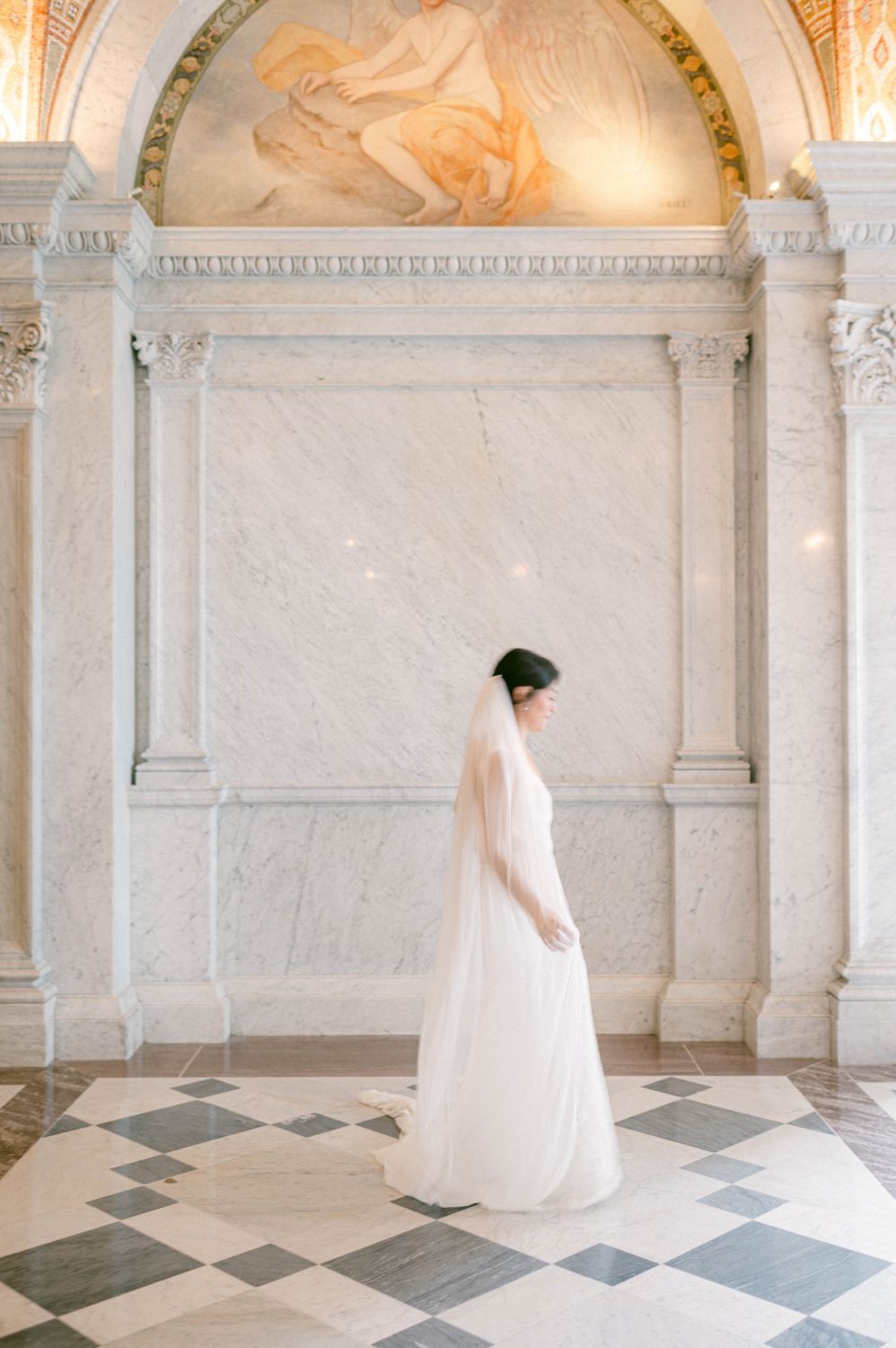 Editorial wedding photography at the Library of Congress featuring direct flash and cinematic movement.