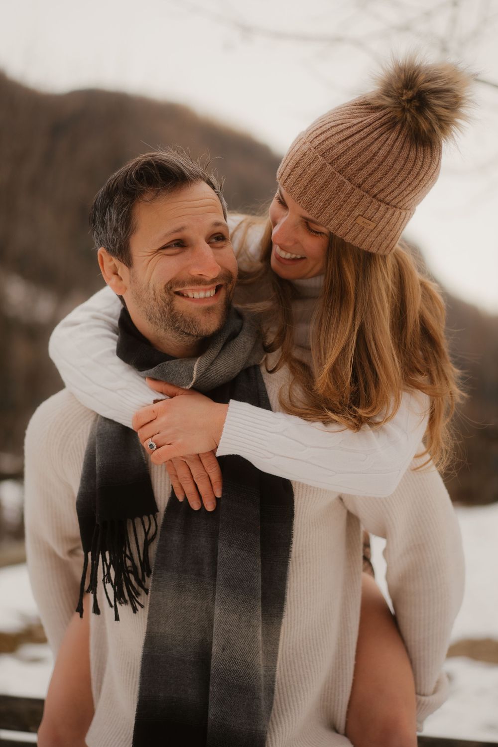 Close up of a romantic couple looking into each other's eyes during a Dolomites session.