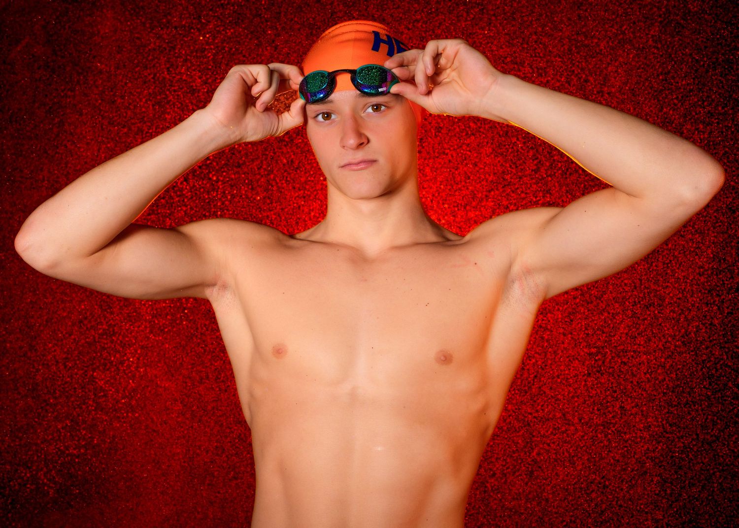 Hershey High School Trojan swimming media day with orange fog background, by SportsFox Photography, Hershey PA