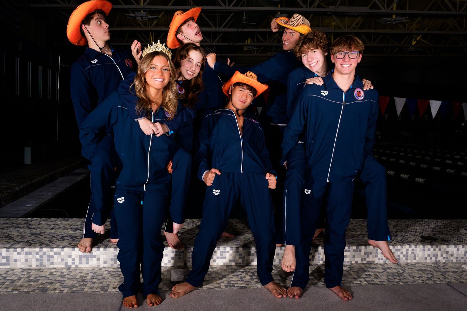 Hershey High School Trojan swimming media day with orange fog background, by SportsFox Photography, Hershey PA