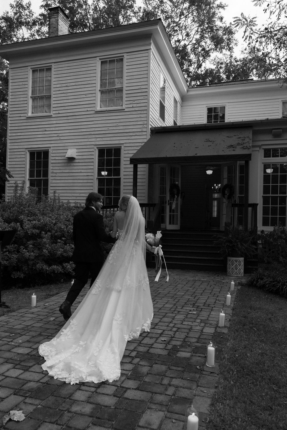 A black and white photo of an outdoor wedding ceremony in Coosada, Alabama